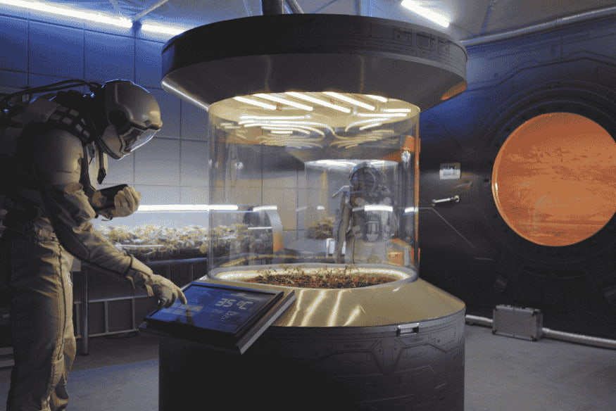 Astronauta em laboratório espacial analisando ambiente simulado, cena ligada à astrobiologia e à busca por sinais de vida fora da Terra.